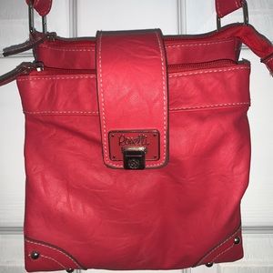 Rosetti pink expandable crossbody bag